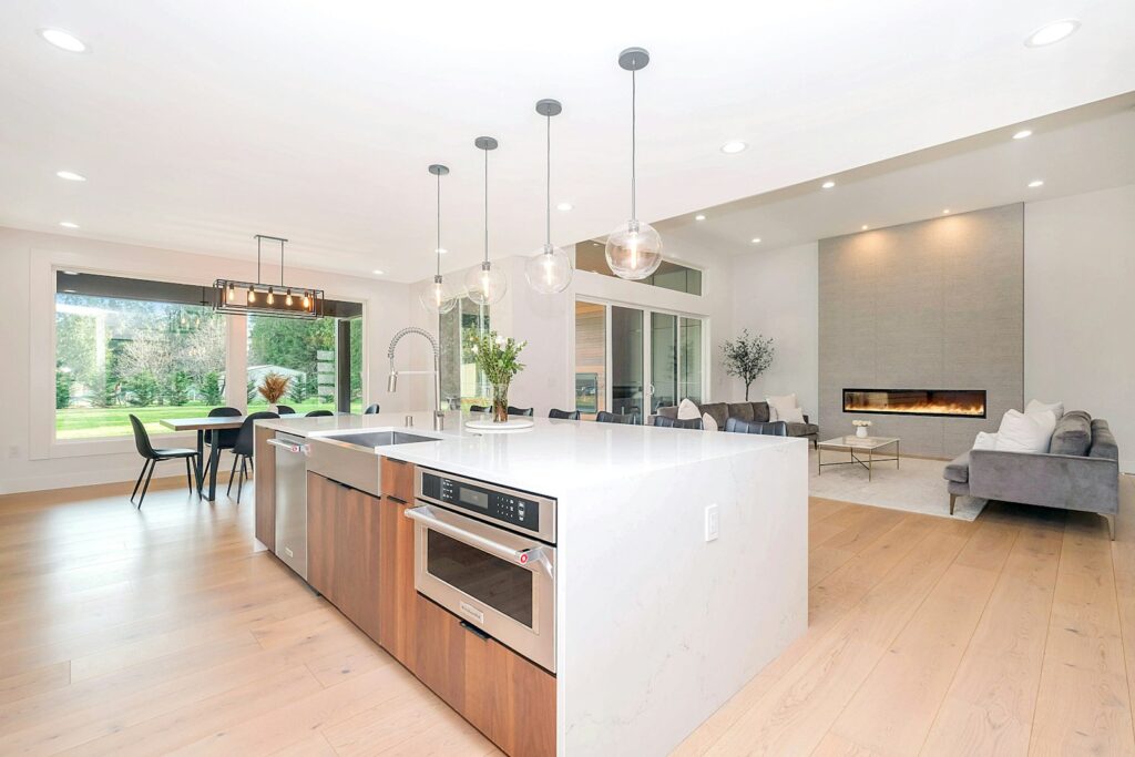 White and brown kitchen counter and units in a bright, welcoming kitchen space
